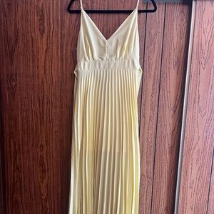Yellow pleated dress